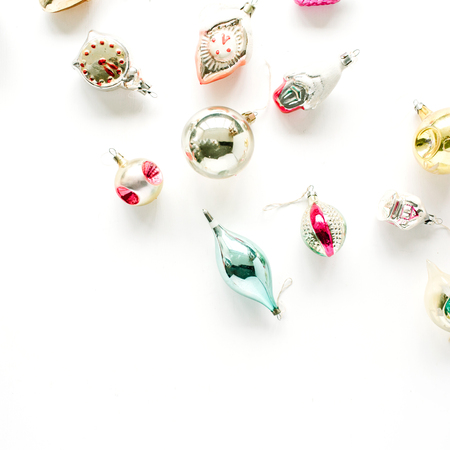 creative arrangement of bright christmas balls and toys on white background. flat lay, top viewの写真素材