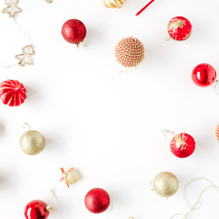 frame made of christmas decoration with christmas glass balls, tinsel, bow. christmas wallpaper. flat lay, top viewの写真素材