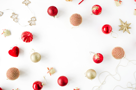 frame made of christmas decoration with christmas glass balls, tinsel, bow. christmas wallpaper. flat lay, top viewの写真素材