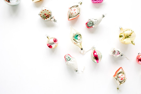 creative arrangement of bright christmas balls and toys on white background. flat lay, top viewの写真素材