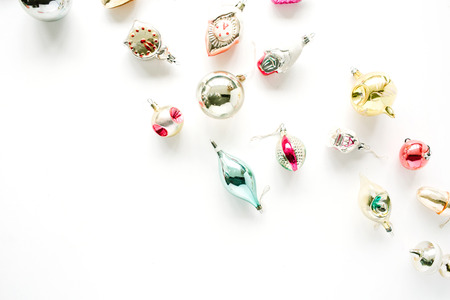 creative arrangement of bright christmas balls and toys on white background. flat lay, top viewの写真素材