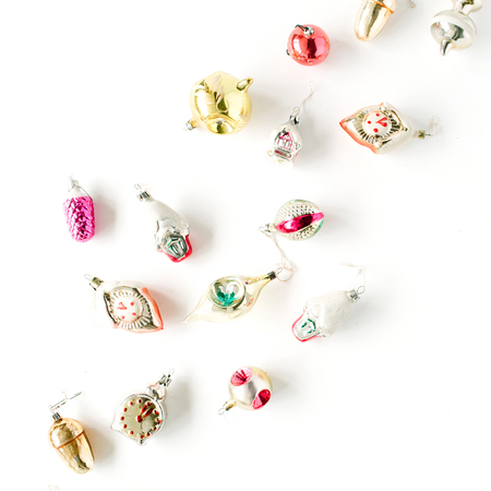 creative arrangement of bright christmas balls and toys on white background. flat lay, top viewの写真素材