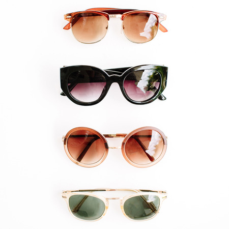 flat lay, top view sunglasses on white backgroundの写真素材