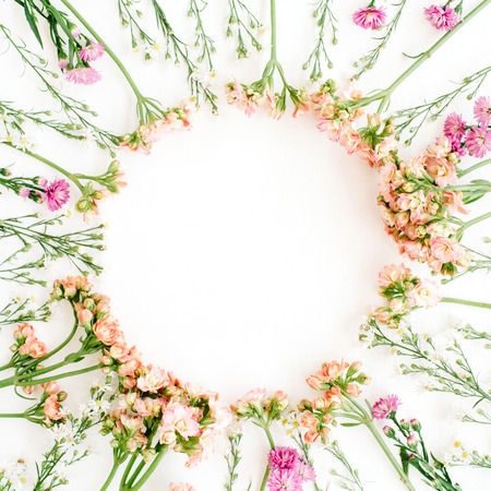 Wreath frame made of wildflowers. Flat lay, top view. Valentine's backgroundの写真素材