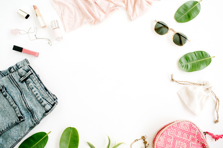 Frame of trendy feminine clothes and accessories. Flat lay, top viewの写真素材