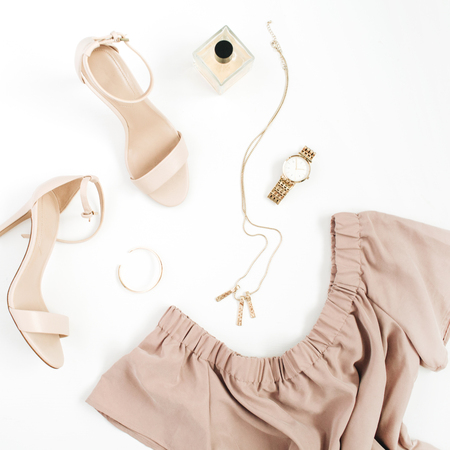 Woman trendy fashion clothes and accessories collage on white background. Flat lay, top view.の写真素材