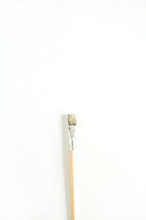 Paint brush on white background. Flat lay, top view minimal concept.の写真素材