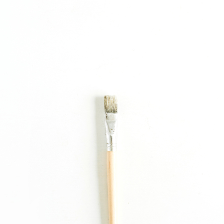 Paint brush on white background. Flat lay, top view minimal concept.の写真素材