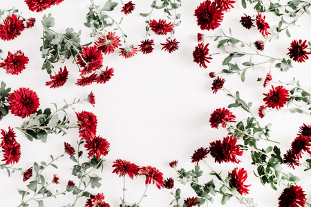 Floral frame of red flowers. Flat lay, top view. Valentine's background. Flowers concept. の写真素材