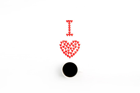 "I Love coffee" made of red hearts on white background. Flat lay, top view Love concept.の写真素材