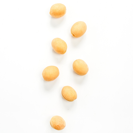 Yellow apricots isolated on white background. Flat lay, top view.の写真素材