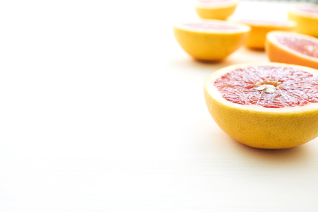 Sliced grapefruits on white background.の写真素材
