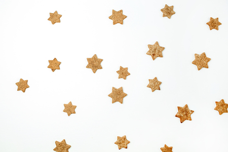 Gingerbread cookies pattern on white background. Flat lay, top view Christmas, New Year concept.の写真素材