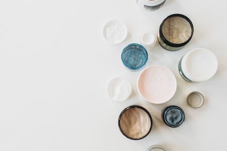 Healthcare, spa, beauty collage with cream assortment on white background. Flat lay, top view skin care concept.の写真素材