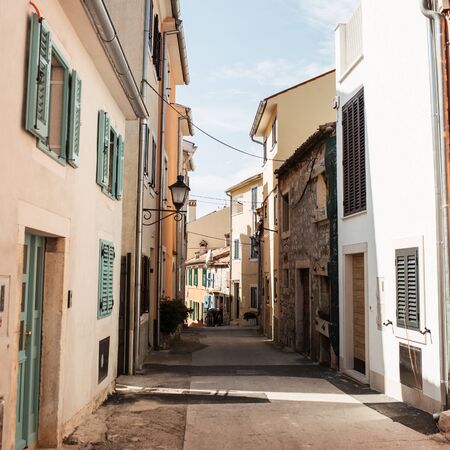 Travel summer concept. Old city view of Europe, Croatia, Istria region, Rovinj. Empty street with...