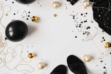 Christmas / New Year celebration concept with blank copy space mockup frame. Champagne glass,...