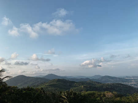 Picturesque view of green mountains agains blue sky. Travel, hiking, vacation backgroundの写真素材