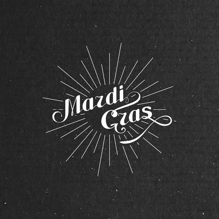 vector typographical illustration of ornate Mardi Gras label on the black cardboard textureのイラスト素材