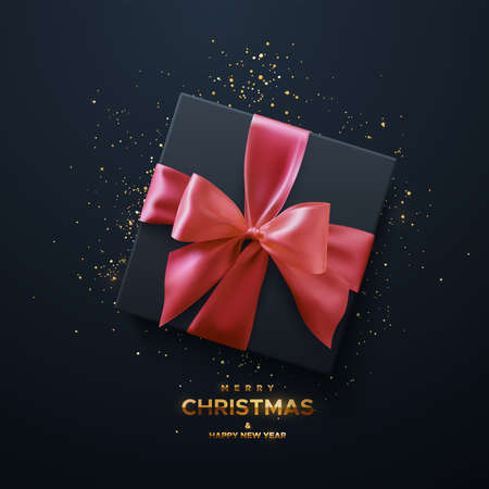 Merry Christmas and Happy New Year golden sign. Black gift box with pink bow and crossing ribbons on black background. Vector holiday 3d illustration. Square box with gold confetti particles. Top viewのイラスト素材