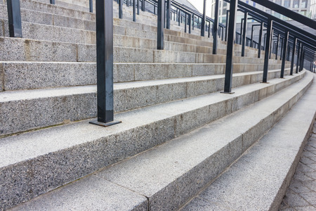 Stone steps with black metal railingの写真素材