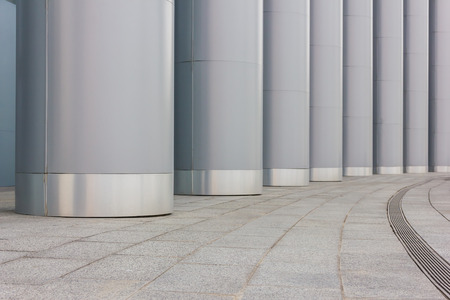 Large metal columns outdoors closeupの写真素材