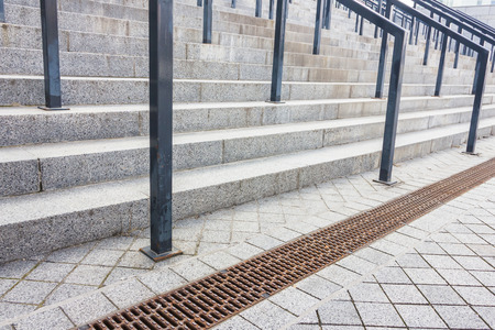 Stone steps with black metal railingの写真素材