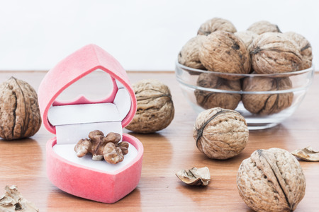 Fresh walnuts on wooden backgroundの写真素材