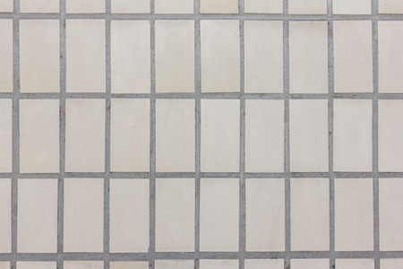 Facade of mat ceramic tile texture. Geometric figures. Rectangles.の写真素材