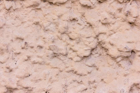 Brown decorative plaster on the wall. Art background.の写真素材