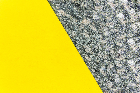 Two-color abstract background. Part yellow and part marble. Texture of natural marble background. Patternの写真素材