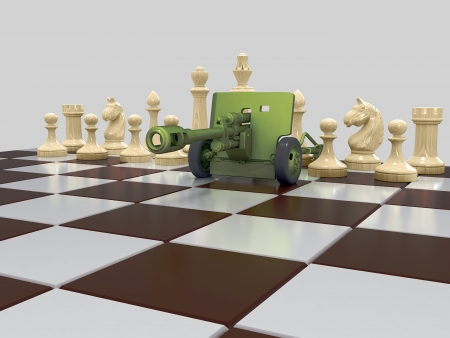 Cannon and a group of white figures on a chess board. On a gray backgroundの写真素材
