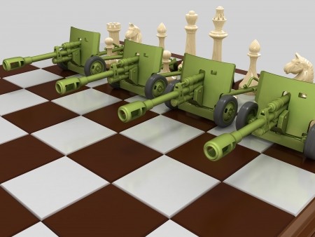 Four cannons and a group of white figures on a chessboard. On a gray background.の写真素材