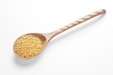 Millet on wooden spoons.の写真素材