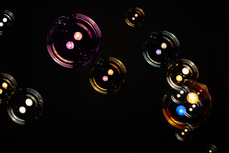 Soap bubbles on black background
