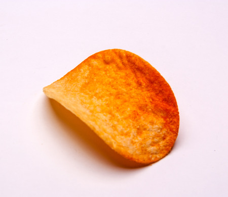 Potato chips isolated on white backgroundの写真素材