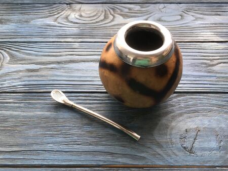 calabash and mate bombilla on wooden backgroundの写真素材