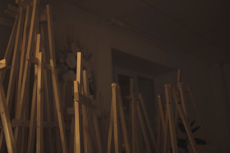 Wooden easels in the art studio. Selective focus.の写真素材