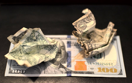 One old type hundred dollar banknote.  Crumpled usa dollar ball, business concept. Wrinkled dollar bill.の写真素材