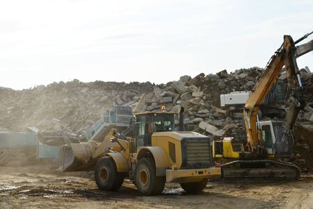 Salvaging and recycling building and construction materials. Industrial waste treatment plant....
