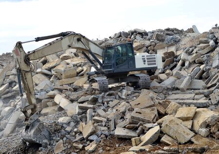 Salvaging and recycling building and construction materials. Industrial waste treatment plant....