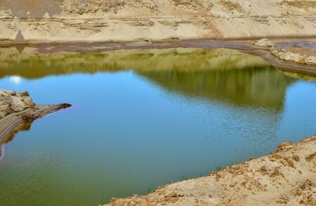 Sand and gravel washing production process in open-pit mining. Crushing the pebbles or ores, washing...