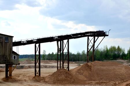 Sand making plant in mining quarry. Crushing factory with production line for crushing, grinding...