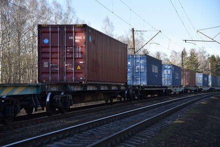 BELARUS, MINSK - MARCH 24, 2020: Cargo shipping containers  on the China-Europe freight train by...