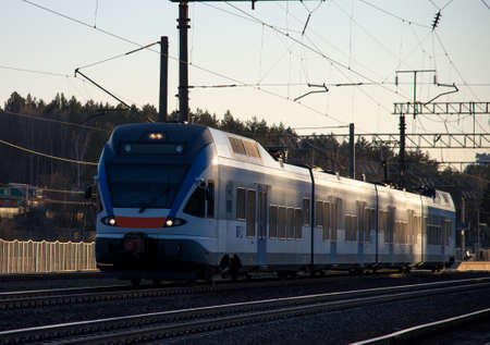BELARUS, MINSK REGION - MARCH 24, 2020: Modern electric high speed passenger train Stadler FLIRT on...