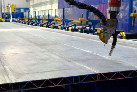 Robotic welding complex in the production workshop factory for the manufacturing of modern rail...
