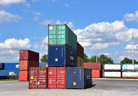 Cargo containers at customs control zone awaits loading for shipment. International Container...
