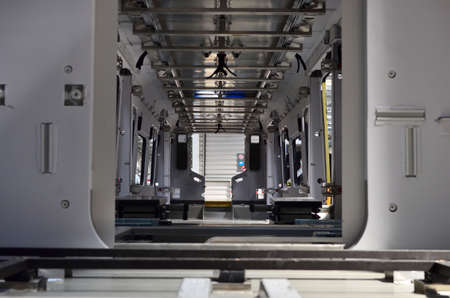 Inside of the rail car assembly plant. Industrial workshop for the production of high speed trains....