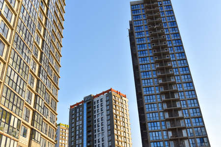 Construction of skeleton of modern residential buildings. Erection multi-storey building. Mineral wool insulation facade. Thermal protection of house. Preparing to pour of concrete into formworkのeditorial素材