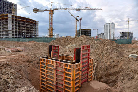 Concrete pile in formwork frame for construct stormwater and underground utilities, pump stations,...