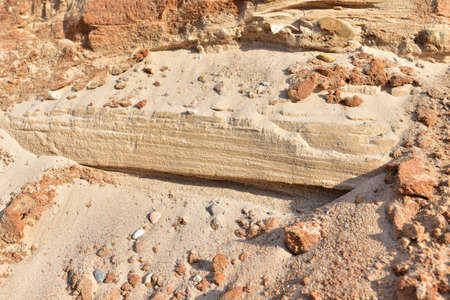 Land structure in open pit mining. Ground background in quarry. Rock texture during earthworks. Sand...
